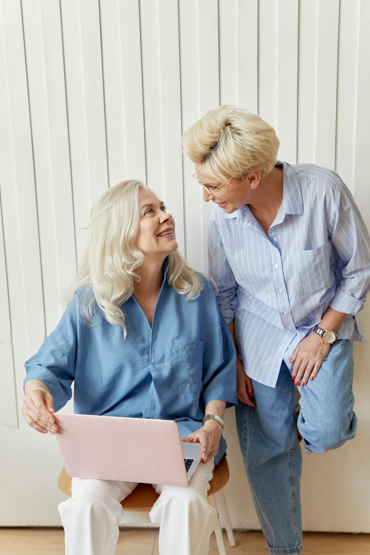 Two mature women talking and smiling together — bone broth and menopause support